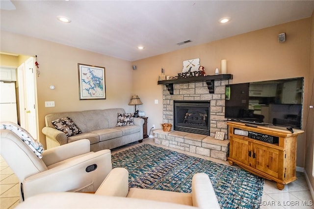 1104 Whippoorwill Ln, Sunrise Beach, MO 65079 - living area with tile patterned flooring, a fireplace, and recessed lighting
