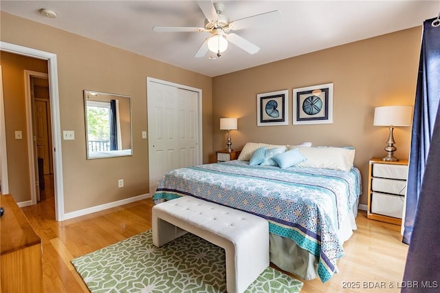 1104 Whippoorwill Ln, Sunrise Beach, MO 65079 - bedroom with light wood-type flooring, a closet, baseboards, and a ceiling fan