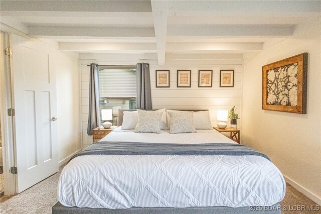 6076 Sioux Trl, Osage Beach, MO 65065 - carpeted bedroom with beamed ceiling and baseboards