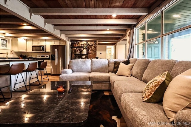 6076 Sioux Trl, Osage Beach, MO 65065 - living area featuring wooden ceiling, beam ceiling, and light wood-style floors