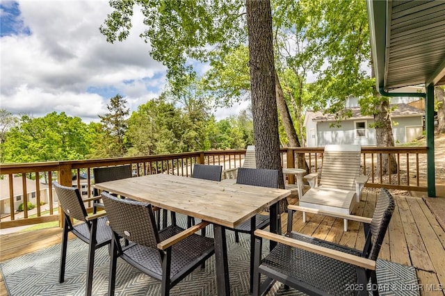 6076 Sioux Trl, Osage Beach, MO 65065 - wooden deck featuring outdoor dining space