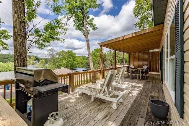 6076 Sioux Trl, Osage Beach, MO 65065 - wooden terrace with outdoor dining space