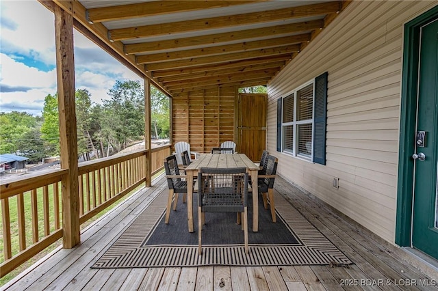 6076 Sioux Trl, Osage Beach, MO 65065 - wooden deck with outdoor dining area
