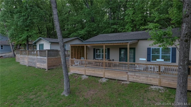 6076 Sioux Trl, Osage Beach, MO 65065 - view of front facade with a front yard
