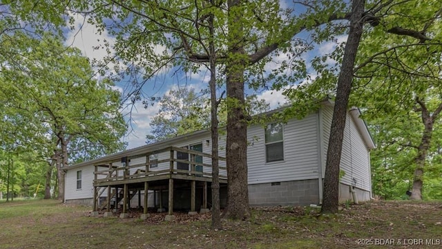 20877 Twin Hills Dr, Warsaw, MO 65355 - rear view of house featuring a deck and crawl space