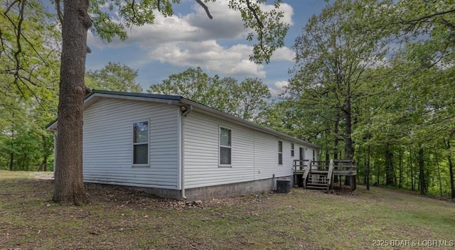 20877 Twin Hills Dr, Warsaw, MO 65355 - view of side of home with a deck and central air condition unit