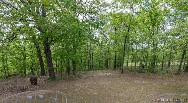 20877 Twin Hills Dr, Warsaw, MO 65355 - view of yard with a wooded view