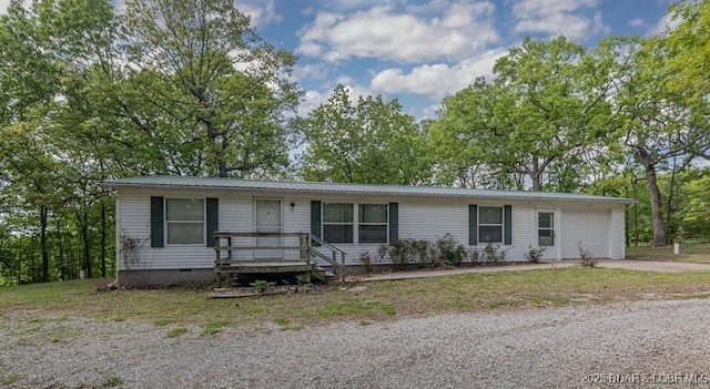 20877 Twin Hills Dr, Warsaw, MO 65355 - single story home with crawl space, a garage, metal roof, and driveway