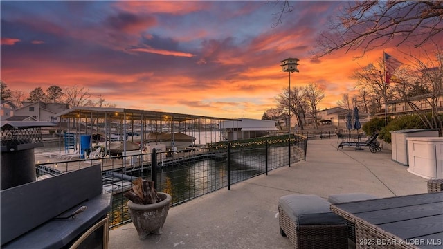 view of patio terrace at dusk