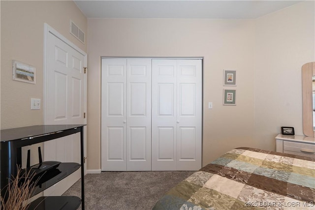 214 Emerald Bay Dr Unit 1D, Lake Ozark, MO 65049 - bedroom featuring carpet flooring, a closet, and arched walkways