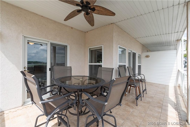 214 Emerald Bay Dr Unit 1D, Lake Ozark, MO 65049 - view of patio with outdoor dining space and a ceiling fan
