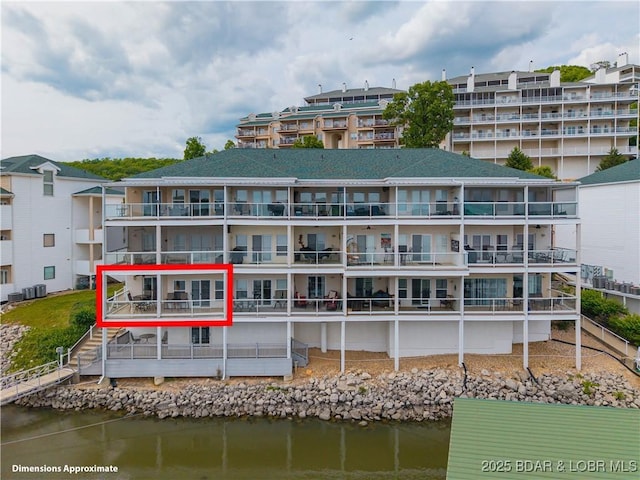 214 Emerald Bay Dr Unit 1D, Lake Ozark, MO 65049 - view of apartment building / complex with a water view