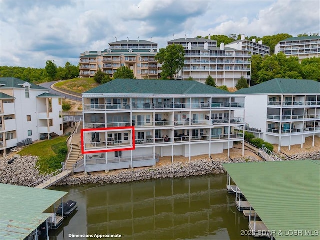 214 Emerald Bay Dr Unit 1D, Lake Ozark, MO 65049 - view of apartment building / complex with a water view