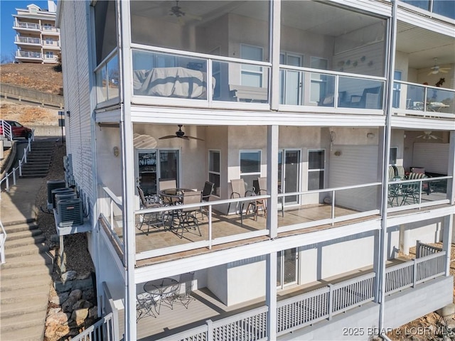 214 Emerald Bay Dr Unit 1D, Lake Ozark, MO 65049 - view of building exterior with stairs