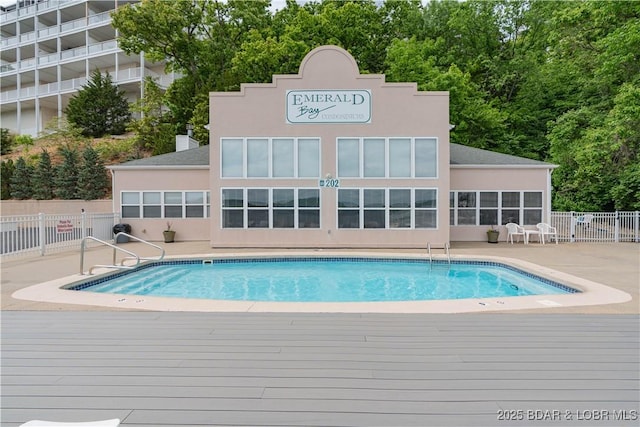 214 Emerald Bay Dr Unit 1D, Lake Ozark, MO 65049 - view of swimming pool with a wooden deck