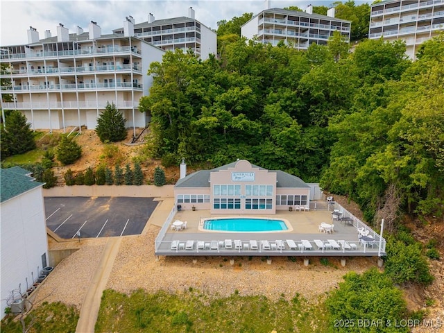 214 Emerald Bay Dr Unit 1D, Lake Ozark, MO 65049 - bird's eye view of apartment complex and a pool