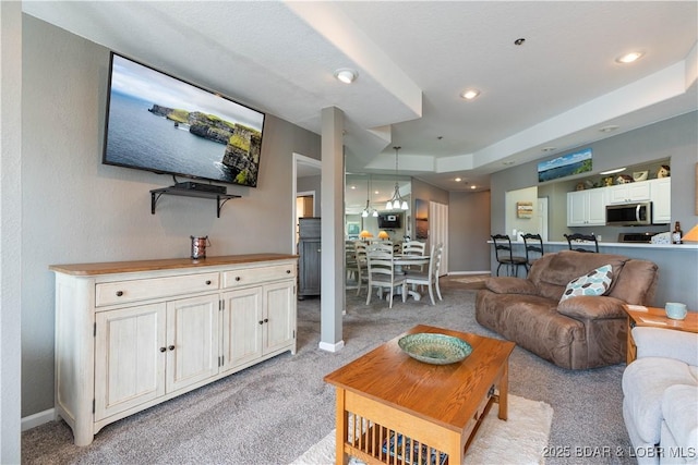 214 Emerald Bay Dr Unit 1D, Lake Ozark, MO 65049 - living room featuring light carpet and recessed lighting