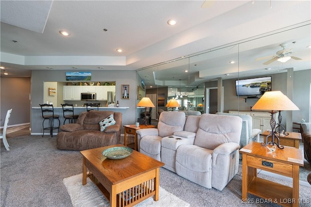 214 Emerald Bay Dr Unit 1D, Lake Ozark, MO 65049 - living room with light colored carpet, recessed lighting, and ceiling fan