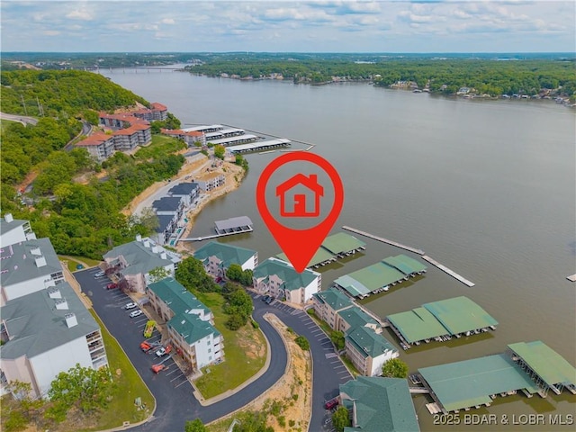 214 Emerald Bay Dr Unit 1D, Lake Ozark, MO 65049 - bird's eye view of a nearby body of water