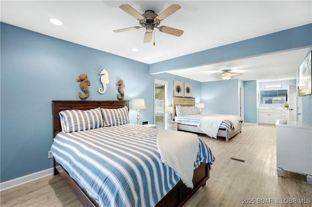 bedroom featuring wood finished floors, baseboards, recessed lighting, and ceiling fan