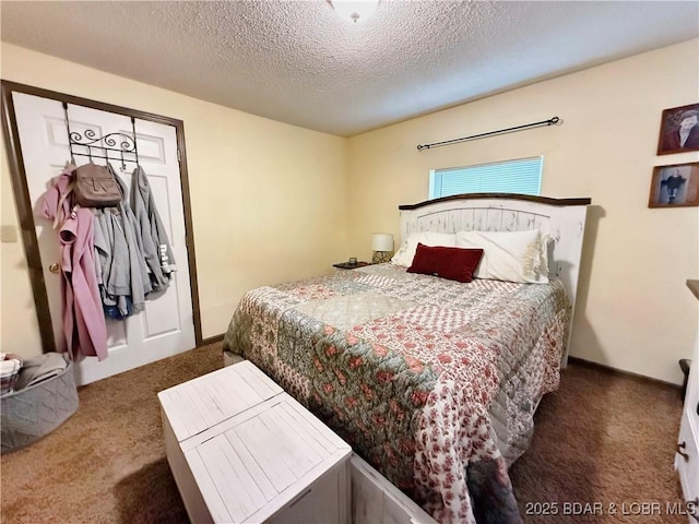 carpeted bedroom with a textured ceiling