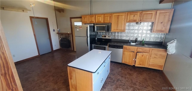 kitchen with stainless steel appliances, a sink, tasteful backsplash, dark flooring, and baseboards