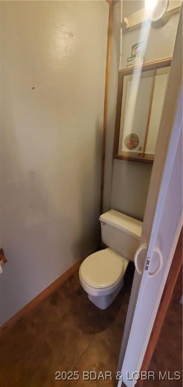 bathroom featuring toilet