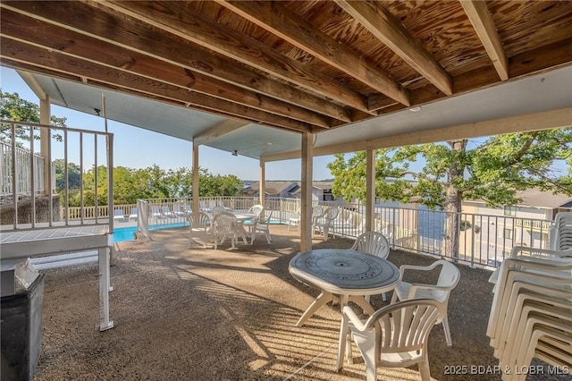 view of patio / terrace featuring fence