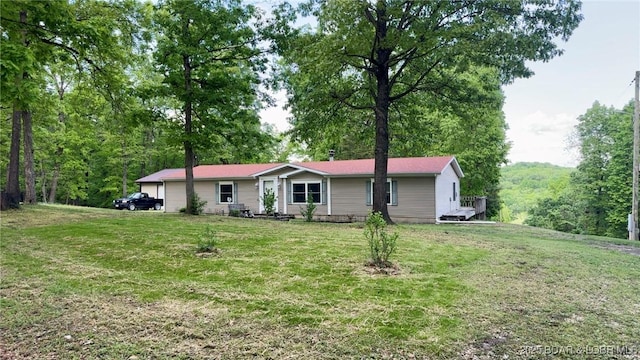 29745 Canary Rd, Gravois Mills, MO 65037 - single story home with a front lawn