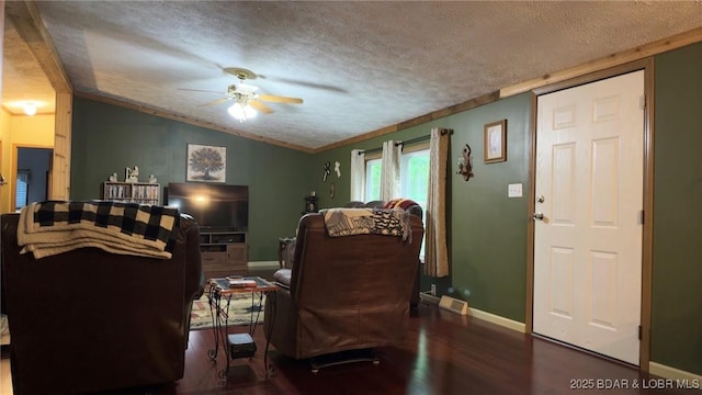 29745 Canary Rd, Gravois Mills, MO 65037 - living area with wood finished floors, a ceiling fan, a textured ceiling, baseboards, and lofted ceiling