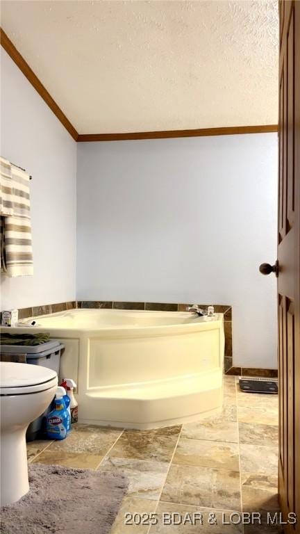 29745 Canary Rd, Gravois Mills, MO 65037 - bathroom featuring crown molding, toilet, a bath, and stone finish flooring