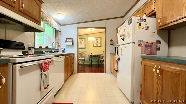 29745 Canary Rd, Gravois Mills, MO 65037 - kitchen featuring white appliances, a sink, ornamental molding, brown cabinets, and under cabinet range hood