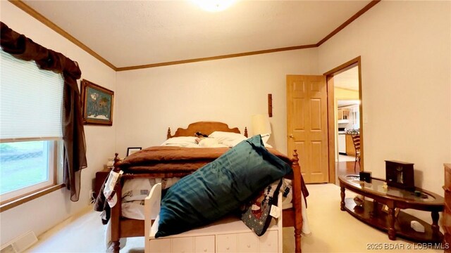 29745 Canary Rd, Gravois Mills, MO 65037 - bedroom featuring crown molding and carpet flooring