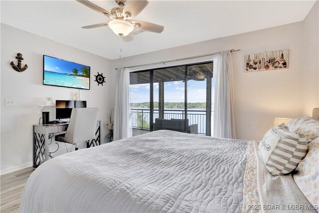 bedroom featuring access to exterior, wood finished floors, baseboards, and ceiling fan