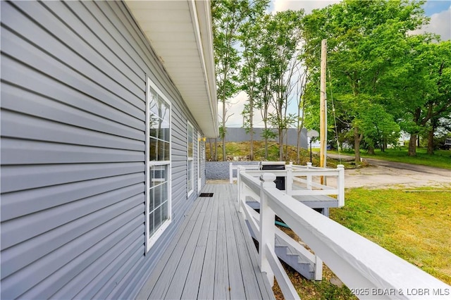 35 Teak Village Dr, Lake Ozark, MO 65049 - deck featuring a yard