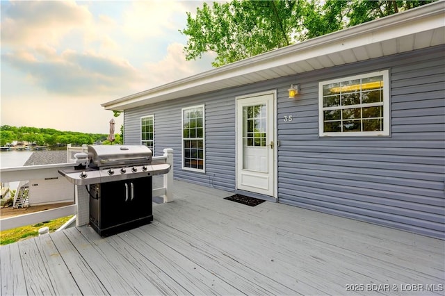 35 Teak Village Dr, Lake Ozark, MO 65049 - wooden deck featuring grilling area