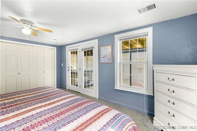 35 Teak Village Dr, Lake Ozark, MO 65049 - carpeted bedroom featuring access to exterior, a closet, ceiling fan, and baseboards