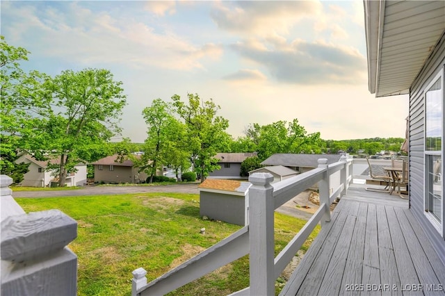 35 Teak Village Dr, Lake Ozark, MO 65049 - wooden deck with a lawn