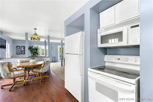 35 Teak Village Dr, Lake Ozark, MO 65049 - kitchen featuring white appliances, white cabinetry, dark wood-style flooring, and open floor plan