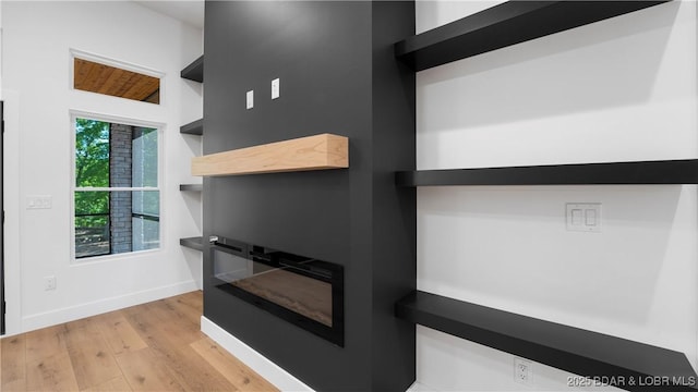 detailed view of wood finished floors and baseboards