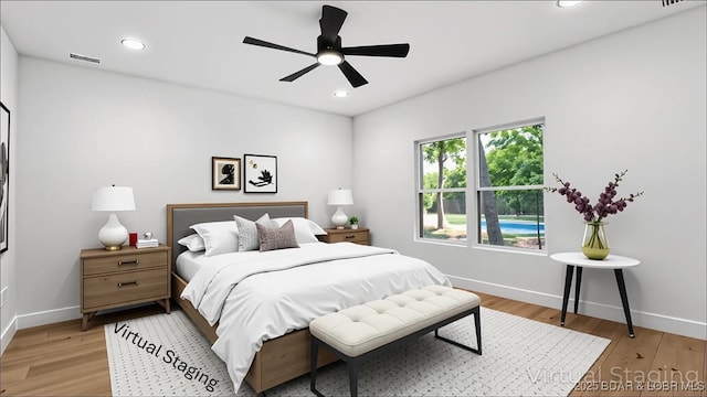 bedroom with baseboards, light wood finished floors, recessed lighting, and ceiling fan