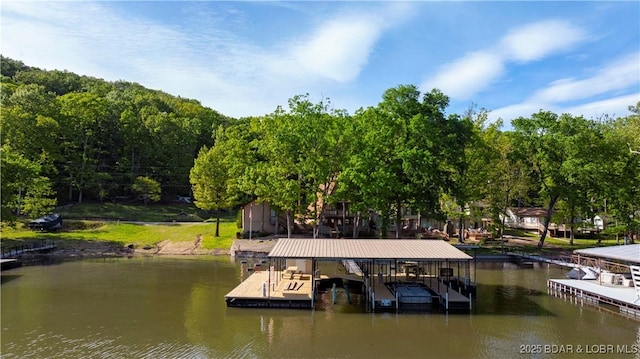 722 Lehman Ln, Sunrise Beach, MO 65079 - dock with a water view and boat lift