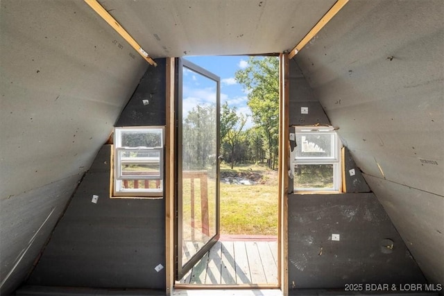 additional living space with lofted ceiling