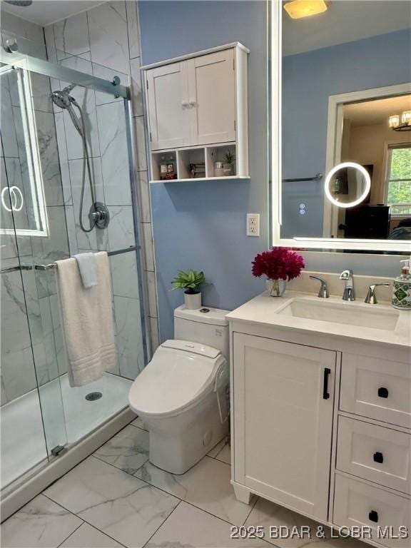 full bath with marble finish flooring, a stall shower, vanity, and toilet