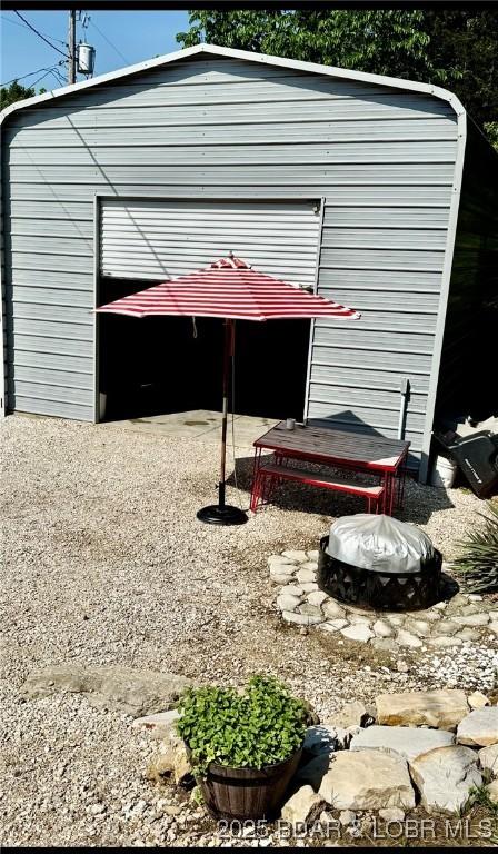 view of outbuilding featuring an outdoor structure