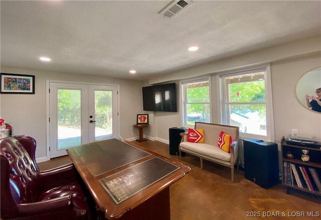 living area featuring french doors, recessed lighting, and baseboards