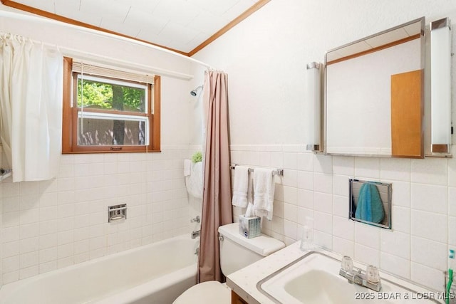 bathroom with toilet, tile walls, vanity, and shower / bath combo with shower curtain