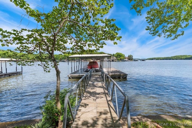 dock area featuring a water view