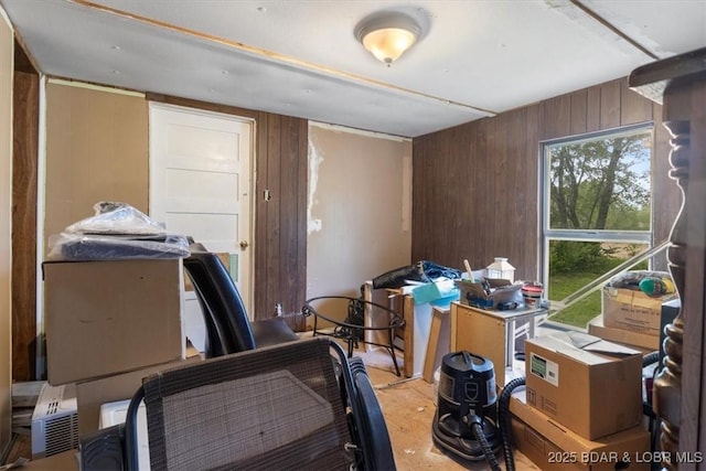 office space featuring wooden walls