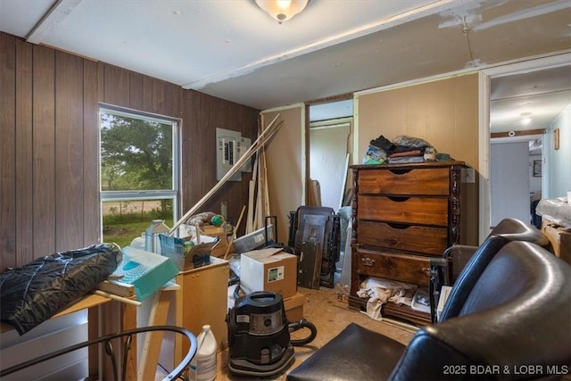 miscellaneous room featuring wood walls